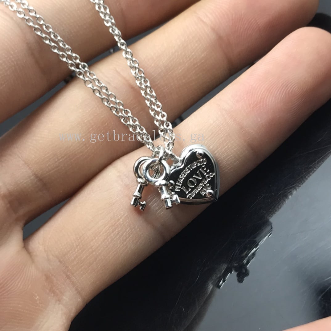 Return to Tiffany Love Heart Tag Key Bracelet in Silver/Rose Gold